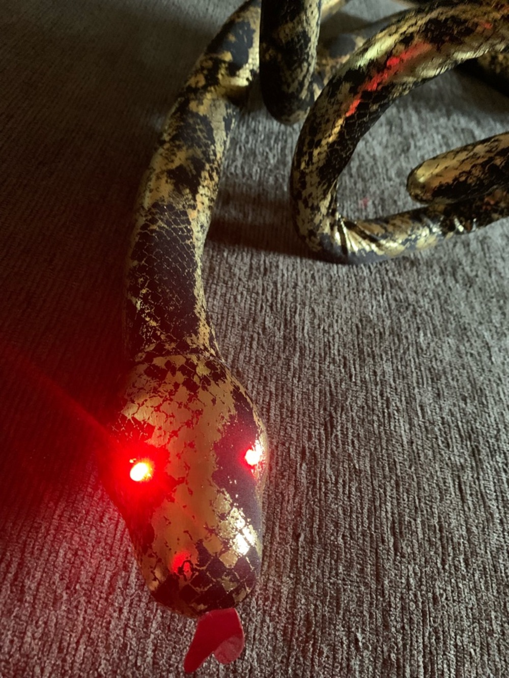 Decor plush snake toy feat/ realistic metallic sequin-like scales light-up eyes